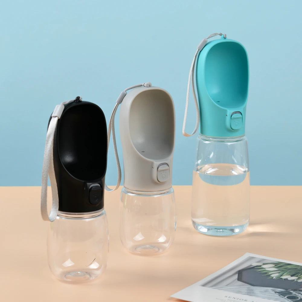 Zoomies Australia portable dog water bottle in black gray and teal with attached wrist straps for easy carrying