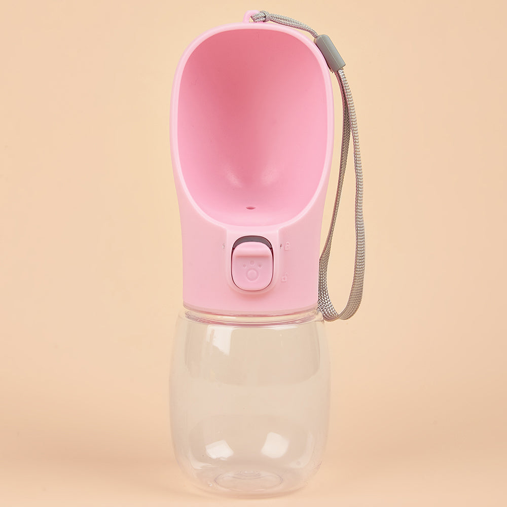 Zoomies Australia pink portable dog water bottle with attached drinking trough and wrist strap